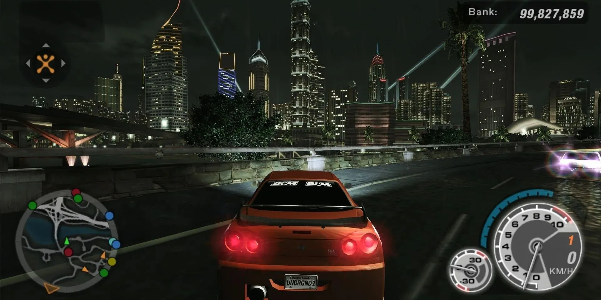 Cảnh đua xe đêm trong Need for Speed Underground 2 trên PS2 với xe Nissan Skyline