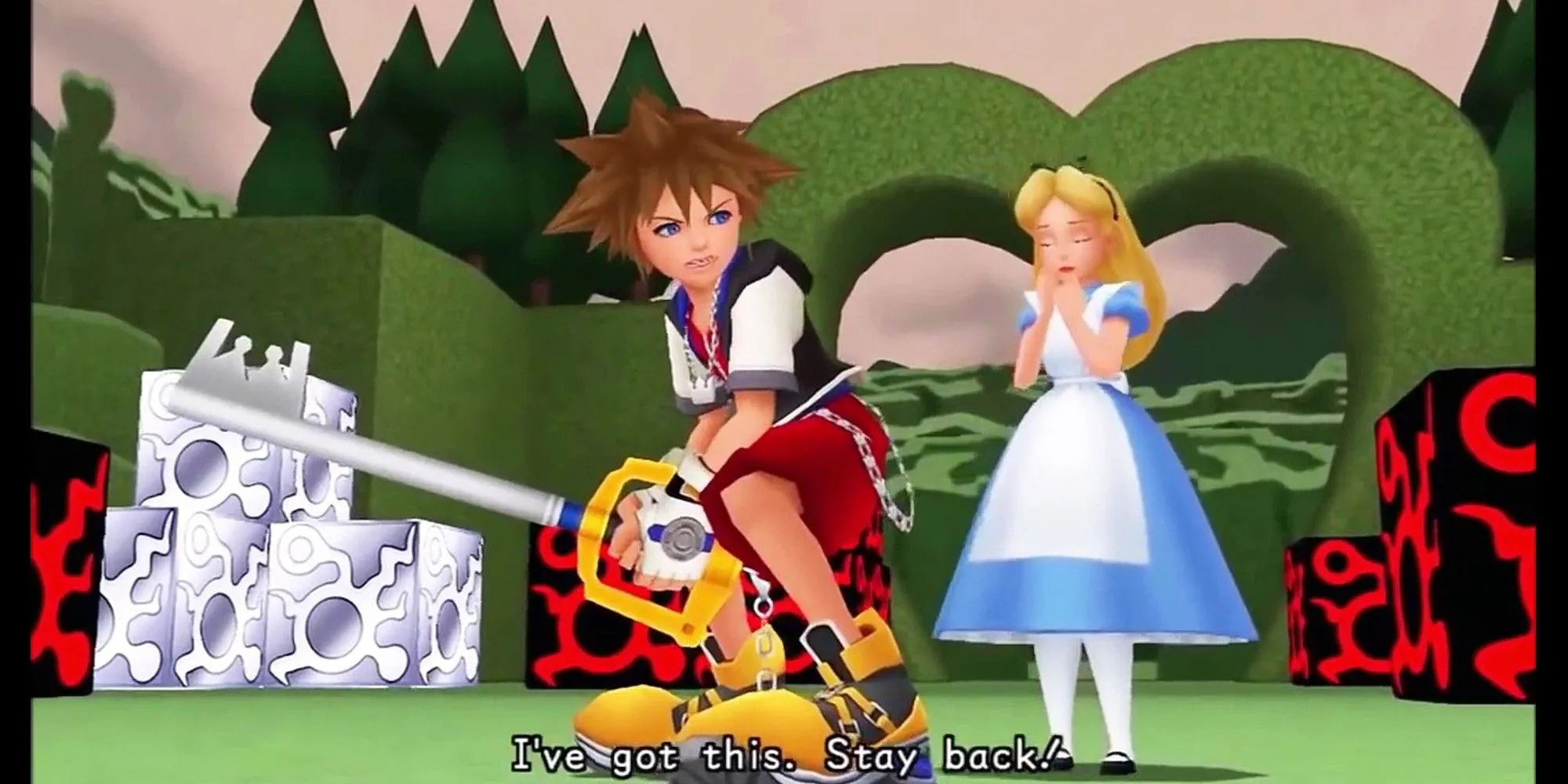 Sora bảo vệ Alice trong thế giới Wonderland của Kingdom Hearts 1