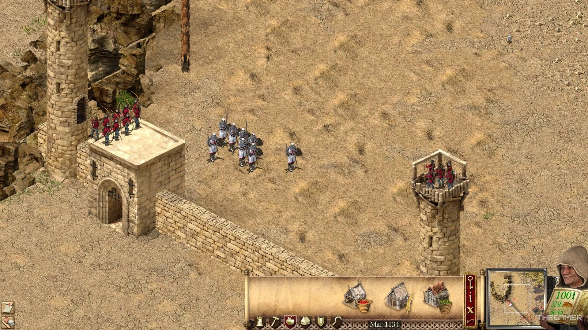 Một nhóm kiếm sĩ và cung thủ phòng thủ cổng thành trong Stronghold Crusader: Definitive Edition