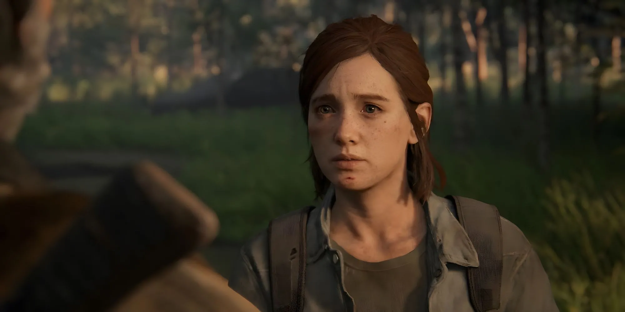 Ellie và Joel đối mặt trong một khoảnh khắc đầy cảm xúc từ The Last of Us Part II, minh họa cho sự thay đổi cốt truyện gây tranh cãi