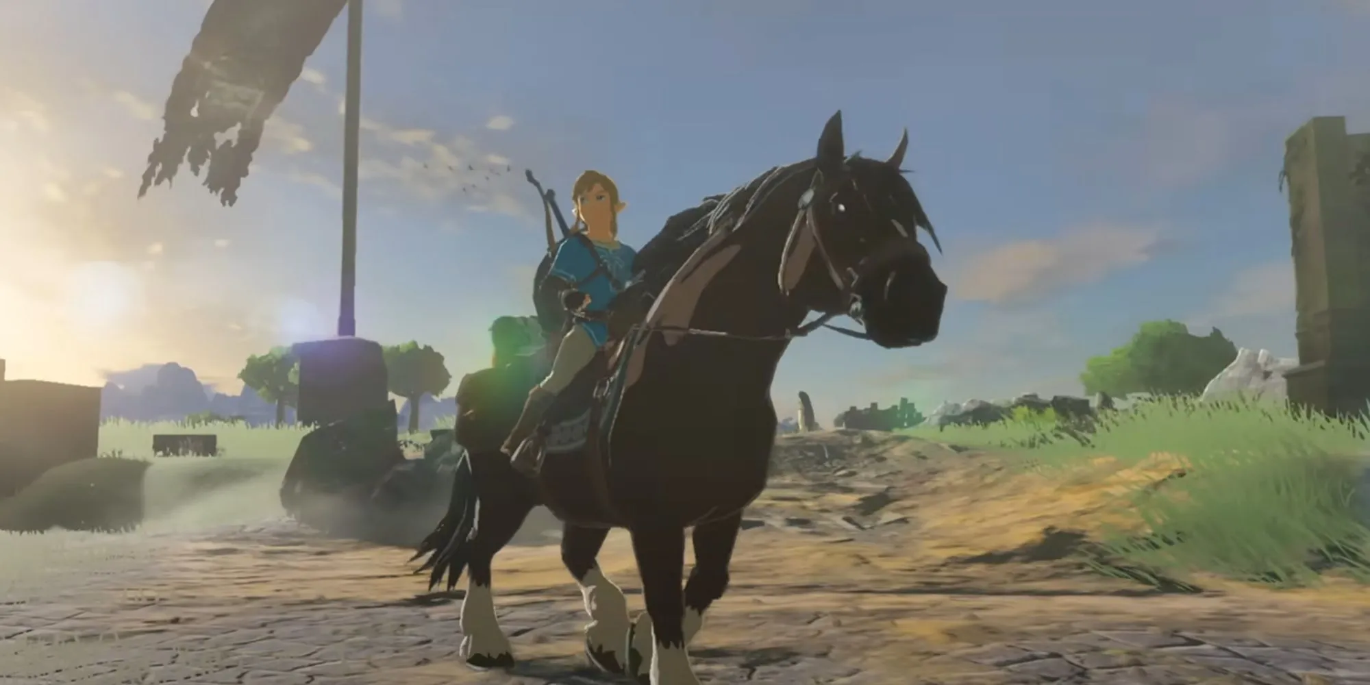 Link cưỡi ngựa khám phá đồng cỏ rộng lớn của Hyrule trong The Legend of Zelda: Breath of the Wild, minh họa sự tự do phiêu lưu trong thế giới mở.