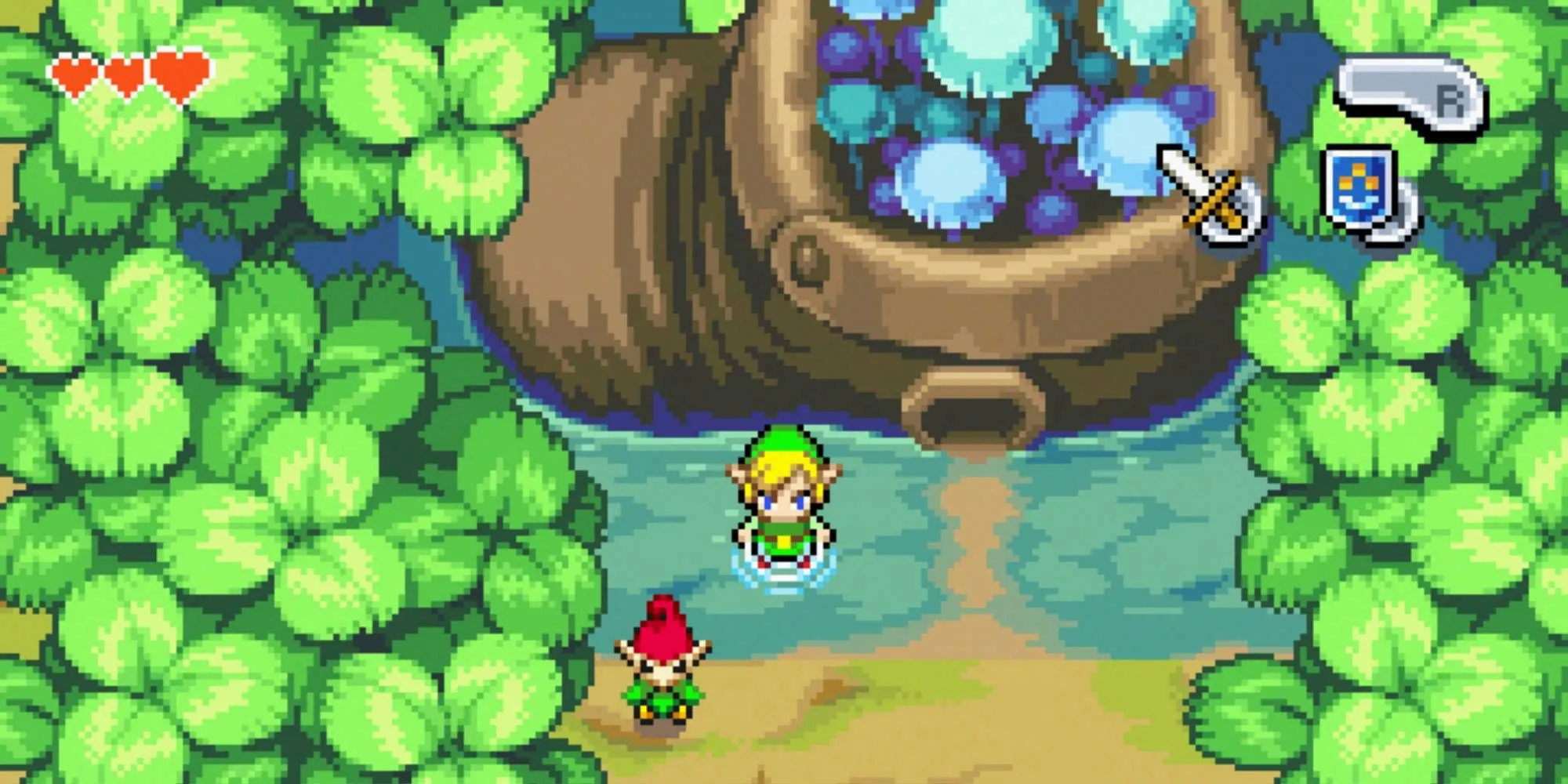 Link trong hình dạng tí hon cùng Picori khám phá thế giới rộng lớn của The Legend of Zelda: The Minish Cap, với ngôi nhà hình chiếc giày độc đáo.