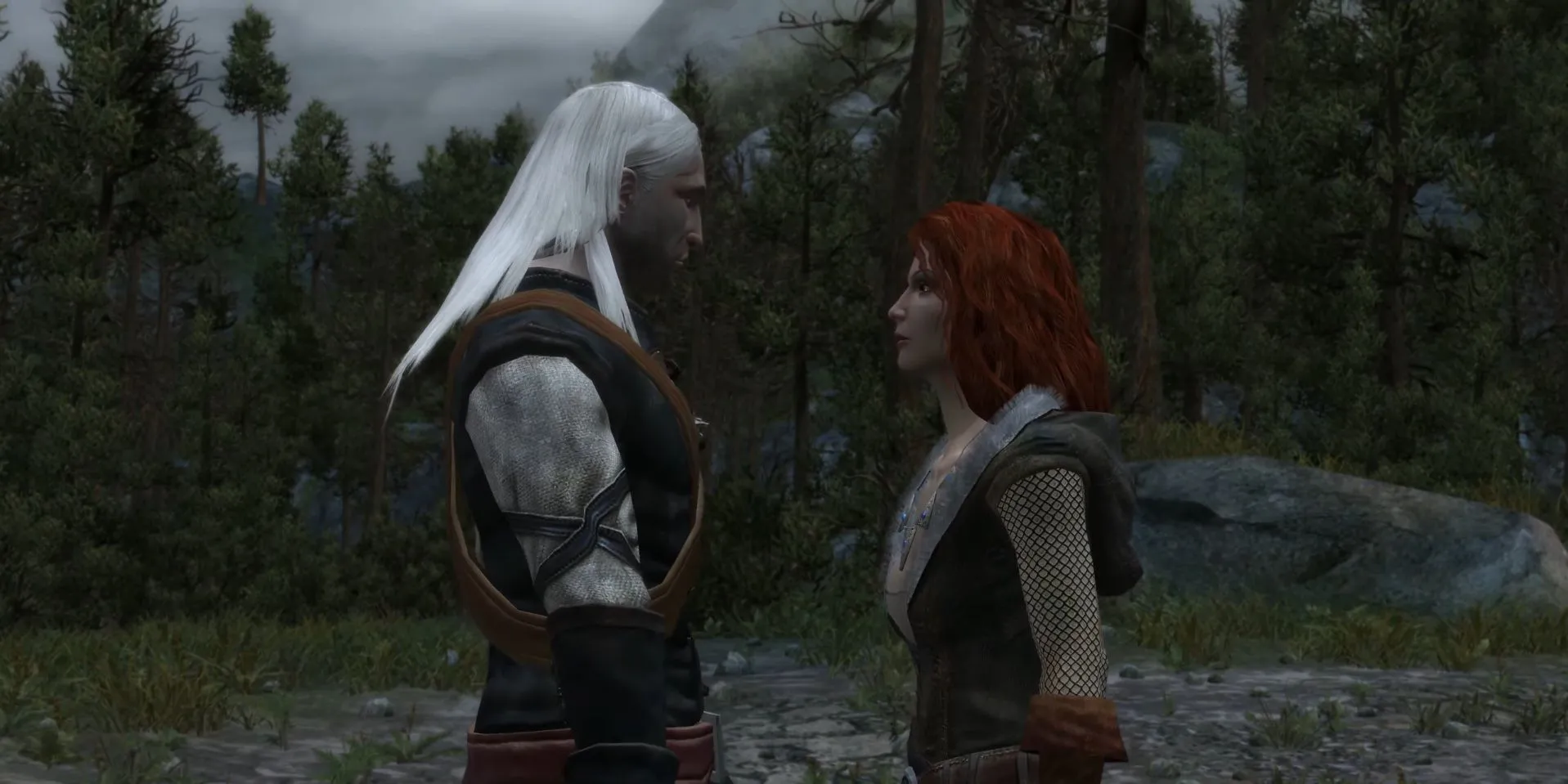 Geralt và một phù thủy nữ trong bối cảnh The Witcher 1, thể hiện sự tối tăm và huyền bí của game