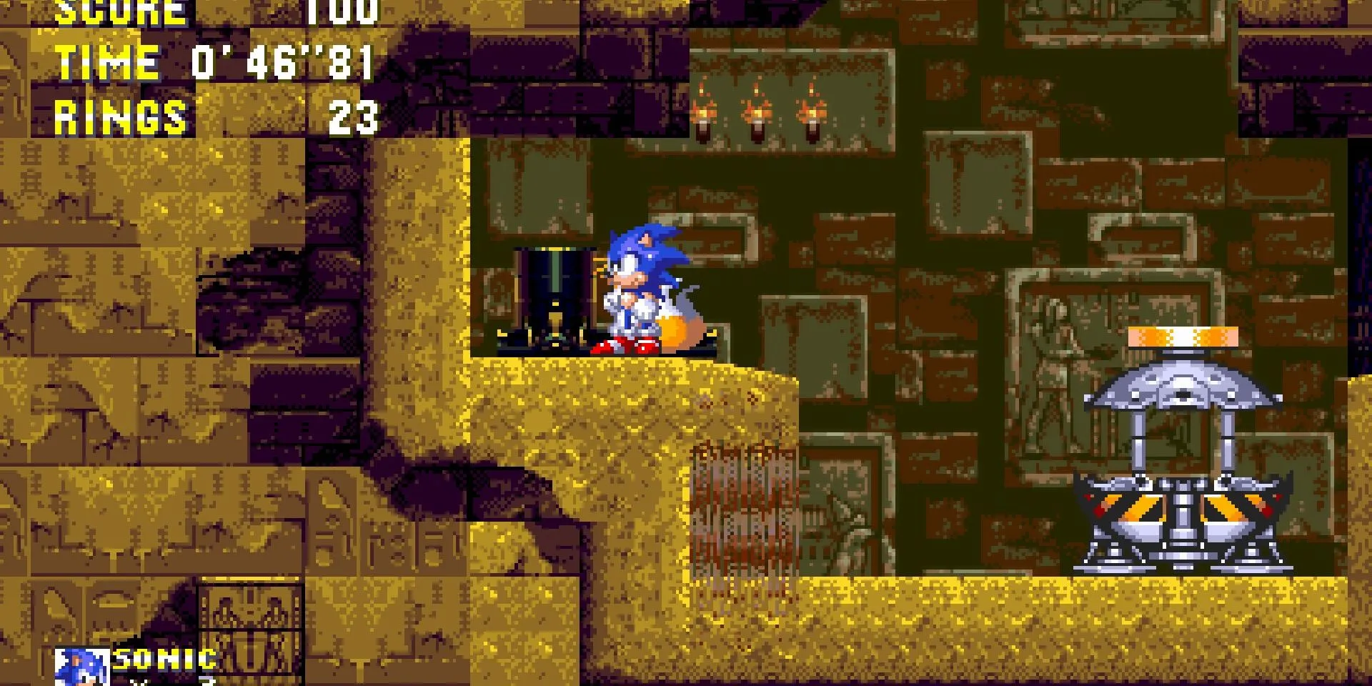 Khung cảnh Sandopolis Zone trong Sonic 3 &amp; Knuckles, đặc trưng bởi kim tự tháp và cơ chế ánh sáng-bóng tối.