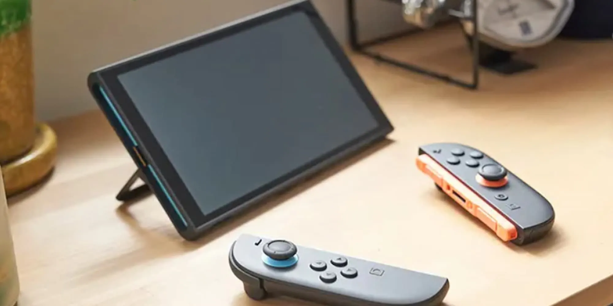 Nintendo Switch 2 trong chế độ cầm tay, minh họa vấn đề hao pin khi ở chế độ ngủ