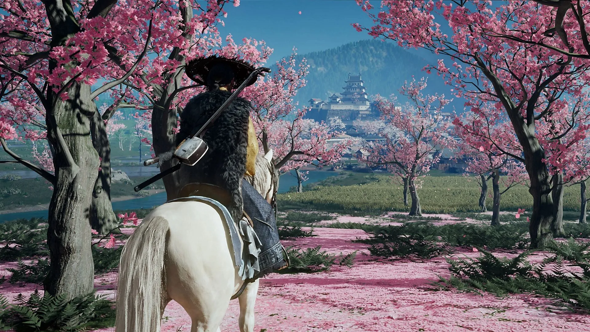 Atsu cưỡi ngựa băng qua đồng hoa trắng ở Yotei