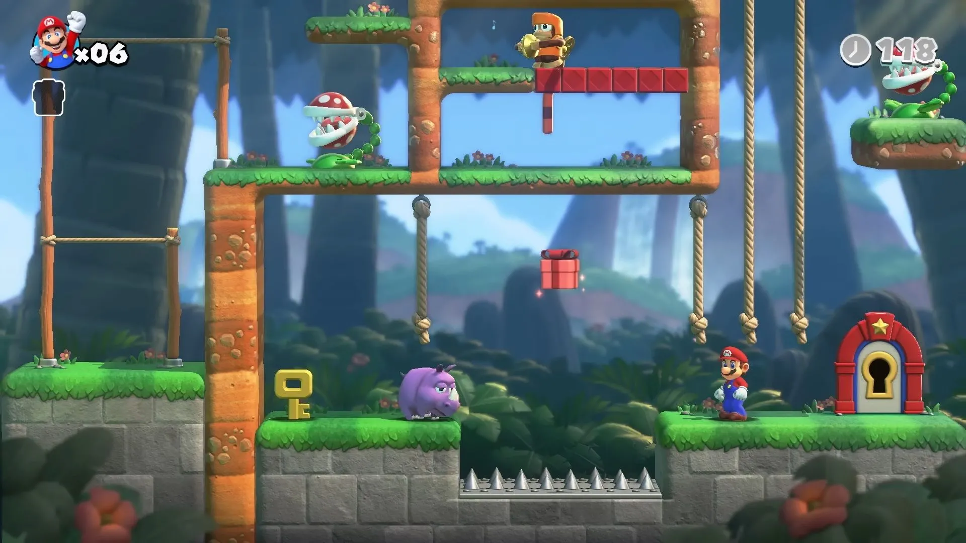 Cảnh giải đố một màn chơi trong Mario vs. Donkey Kong trên Switch, thể hiện phong cách puzzle-platform của bản remake