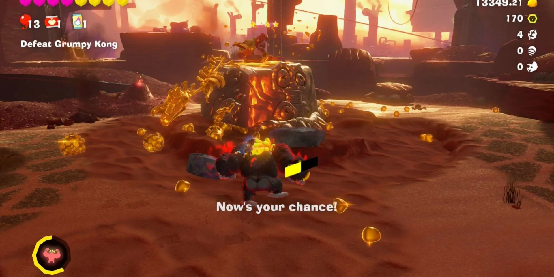 Donkey Kong Bananza trong màn đánh trùm với khu vực bị Kong xé toạc, cho thấy mechanic phá hủy lõi của game