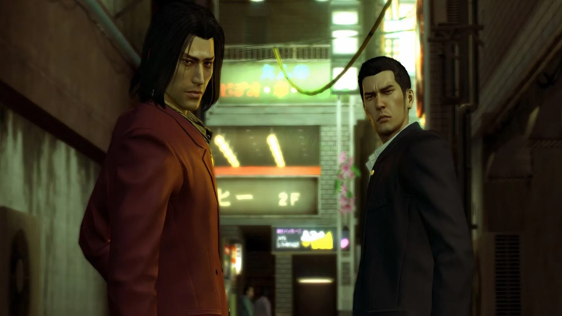 Kazuma Kiryu và Akira Nishikiyama đứng ngoài trời trong Yakuza Zero