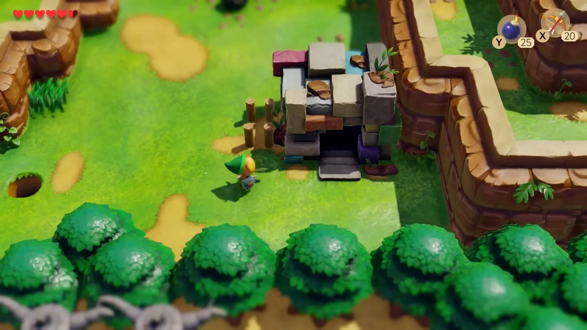 Link tiếp cận một nhân vật Dampe trong bản Link's Awakening làm lại, thể hiện phong cách đồ họa mô hình hóa độc đáo trên Switch