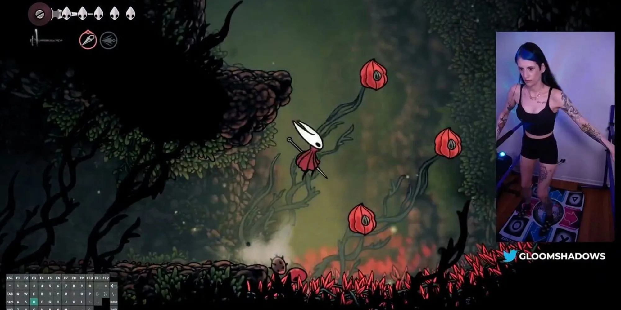 Streamer Gloomshadows thao tác bàn nhảy khi chơi Silksong, thể hiện kỹ năng nhảy chính xác và kiểm soát chuyển động